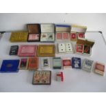 A collection of various vintage playing cards etc