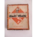 A vintage boxed Monopoly game, manufactured by John Waddington Ltd.