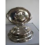 A large ornate silver plated meat cover bearing the motto "Semper Paratus" ( always ready) along