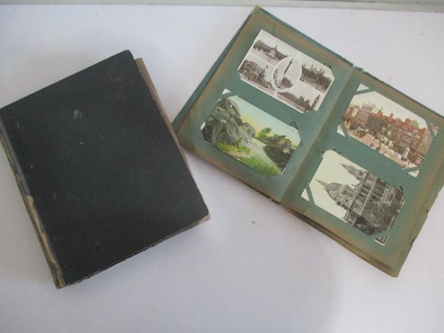 Two albums of vintage postcards