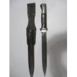 A 41asw bayonet in metal scabbard with leather belt fixings, blade marked 7185, scabbard marked