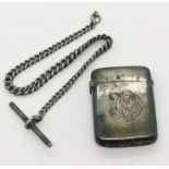 A hallmarked silver vesta case along with a hallmarked silver chain (total weight 49.3g)