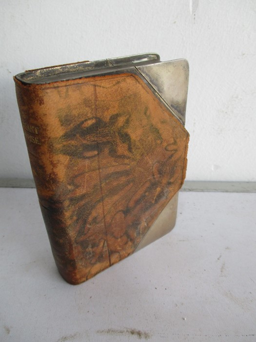 A leather and silver plated hip flask in the form of a book "A pleasant surprise" by James Dixon