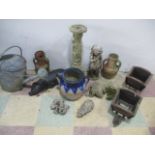A collection of garden ornaments, galvanised watering can etc.