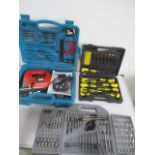 A collection of tools comprising of a Black & Decker jigsaw, drill bits and screwdriver set.