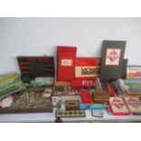 A collection of various vintage games and puzzles including chess, dominoes, miniature fairway golf,