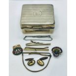 A small silver cigarette case along with hunting themed cufflinks etc
