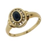 A 9ct gold diamond and sapphire ring