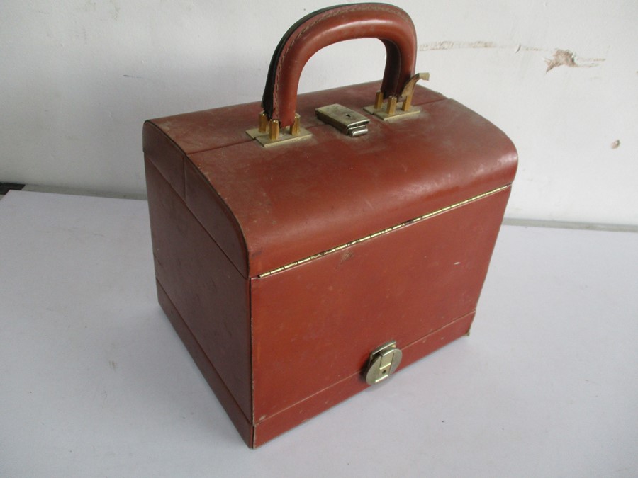A vintage leather "Le Tanneur" Gladstone style case with lower jewellery section- keys in office