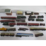 A collection of various locomotives & train carriages etc