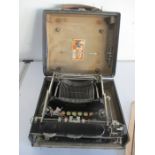 A vintage Corona typewriter in it's case