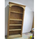 A tall pine bookcase - height 198cm