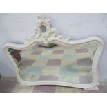 A Victorian painted overmantle mirror with rococo detailing