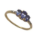 A 14ct gold tanzanite three stone ring