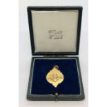 An Irish 9ct gold medallion. Weight 8.3g