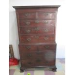 A Georgian mahogany chest on chest with blind fretwork decoration