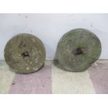 Two mill stones (one 34cm diameter - one 30cm diameter)