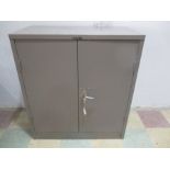 A Roneo Vickers two door cupboard- keys in office