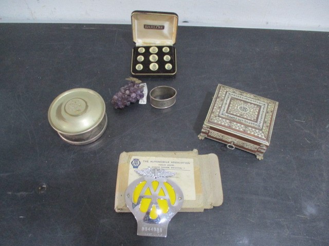 A collection of various items including Christian Dior pot, Islamic box containing Naval buttons