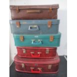 Five vintage suitcases