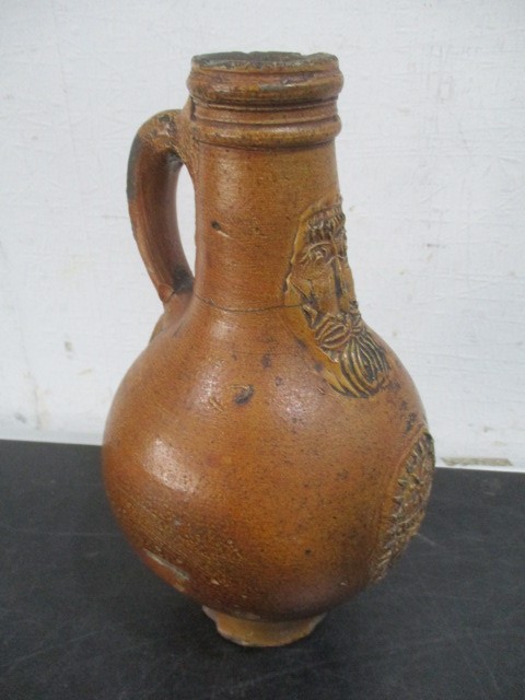 A 17th/18th century Bellarmine jug with bearded mask over armorial- neck repaired- approx 23cm - Image 3 of 15
