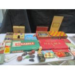 A collection of various games including a Don Confectionary tin in the form of a chess board,