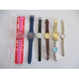 A collection of various watches including Swatch, Seiko SQ100, Accurist, Tissot etc.
