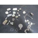 A collection of scrap and melted down 925 silver- weight approx 740g