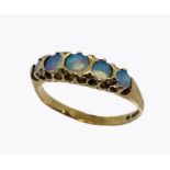 An opal five stone ring set in 9ct gold, size O