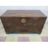 A camphor wood trunk with carved Chinoiserie decoration