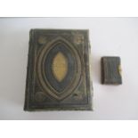 A leather bound Brown's Family Bible, along with a Common Prayer book
