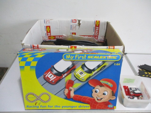 A boxed My First Scalextric set, along with loose Mirco Scalextric set