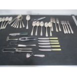 A collection of silver plated cutlery