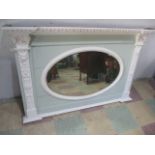 An antique painted overmantle with lion head and pillared decoration
