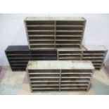 Four industrial wall mounted metal shelving units, each 69cm width