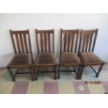 Four oak dining chairs