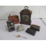 An assortment of interesting items including a Brownie camera, a silver spoon, local fossil etc.