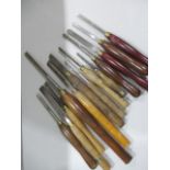 A collection of woodworking chisels/tools