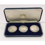 A cased set of hallmarked silver replica Crowns representing the sailing of the Pilgrim Fathers