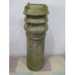 A large vintage chimney pot