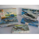 A collection of five boxed models of planes including Airfix "Petylankov Pe-2", Revell "Junkers Ju-