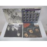 A collection of four rare and 1st press 12" vinyl Beatles albums including Rubber Soul, With the