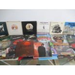 A collection of 12" vinyl records including Queen, Deep Purple, Bad Company, Whitesnake, Supertramp,