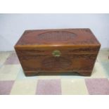 A carved Oriental wooden chest