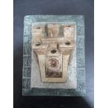 A Troika six aperture wall plaque decorated by Alison Bridgen, rectangular form, cast in low