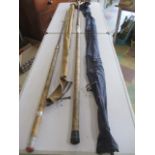 Two vintage fishing rods including a "Superflex" and "Qualtack East Anglian Rod company" in carry