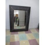 A large wooden mirror