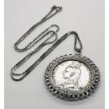 A Victorian 1889 Crown in pendant mount and silver chain. Total weight 44.9g