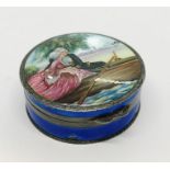 A silver and enamelled pill box with hand painted classical scene to lid- A/F