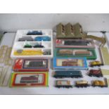 A collection of model railway engines including Lima, along with rolling stock, buildings etc